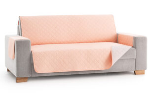 Bankbeschermer Duo omkeerbare microvezel in zalmroze en ivoor op bankhoes.