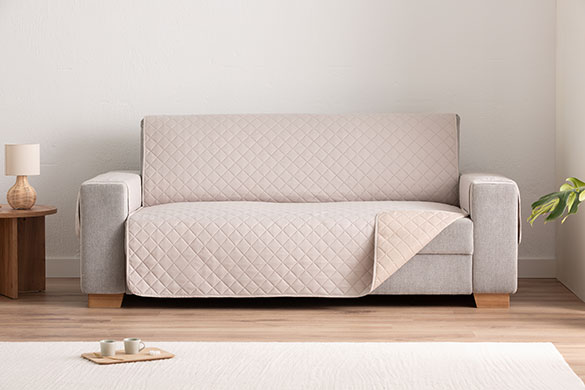 Vergelijking tussen volledige bankhoes en losse bankbeschermer